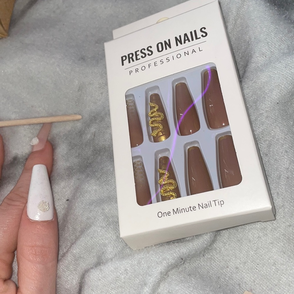 Cute chic nude nails with snake art